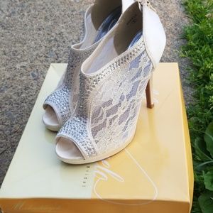 Peep toe heeled booties